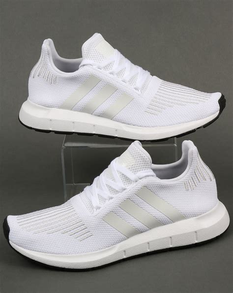 Adidas white running shoes